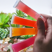 Brillant à lèvres liquide de marque privée avec crème solaire saveur de fraise fruit base à lèvres repulpante taille de voyage vente en gros