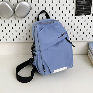 Nylon Sling <b>Bag</b> <b>Small</b> Lightweight Zipper Closure Embossed Logo All Seasons Daily Use Crossbody Backpack With Pendant - Product Image 1