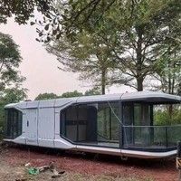 X7 moderne mode luxe design camping capsule maison préfabriquée capsule maison avec système intelligent vaisseau spatial