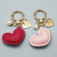 Pendentif pour sac à main femme en cuir coloré motif cœur, accessoires pour téléphone portable, petit porte-clés frais et tendance, modèle international très prisé