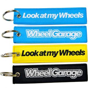 Promotional Wholesale Custom Brand Name Travel Souvenir Woven Embroidery Logo Fabric Keychains - Product Image 3