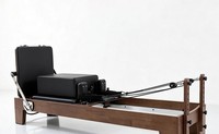 Machine de Pilates Reformer en noyer pour studio commercial, avec ressort à fil de piano et appui-tête réglable