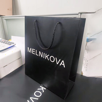 Custom Logo 230 Gramos Paperboard Paper Bags Coated Paper for Craft and Candle Black Gift Clothes Bolsas Papel for Shopping