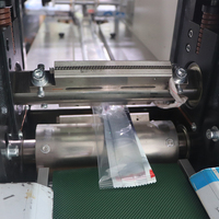 Machine d'emballage automatique pour barres de crème glacée, bâtonnets de glace et sucettes glacées (emballage oreiller)