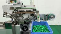 Machine d'emballage en aluminium pour confiseries de forme spéciale imitation bouteille, haute efficacité, entièrement automatique, conçue sur mesure