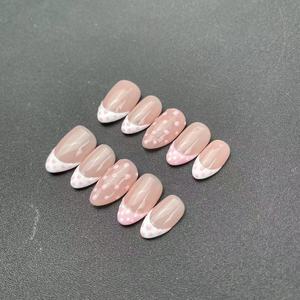 Las uñas cortas de almendra hechas a mano de alta calidad, borde de estilo francés blanco, se pueden reutilizar, venta al por mayor de fábrica - Product Image 3
