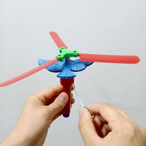 Jouet tournant à cordon, fée volante manuelle, jouet à tirer, soucoupe volante, moulin à vent, jouet pour enfants à un yuan - Product Image 5