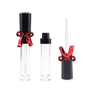 2024 Großhandel einzigartige luxuriöse rote schleife leere lipgloss-behälter schmetterlingsdeckel kunststoff lipgloss-röhren verpackung