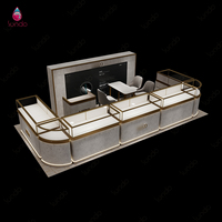 Vitrine de luxe Sundo pour bijoux, présentoir de bijouterie pour centre commercial, comptoir finition pierre, or, sur mesure, fabricant pour magasin de détail
