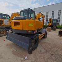 Excavatrice sur pneus d'occasion 7 tonnes XINYUAN 75, faible nombre d'heures, bon état, en stock à vendre