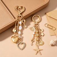 Porte-clés en alliage de zinc avec perles superposées, pendentif cœur, coquillage, étoile et lune plaqué or pour femme, décoration de sac à main