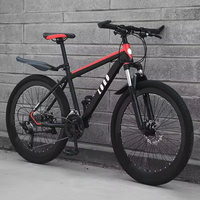 Vélo de montagne 21 vitesses, frein à disque, cadre en acier de 1,6 m, jante en alliage d'aluminium, fourche à suspension, roue de 26 pouces pour le cyclisme en montagne