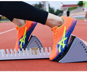 Chaussures de course unisexe haute performance avec semelle extérieure légère en TPU à rebond pour la course de vitesse et les examens physiques - Product Image 5