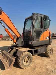 Excavatrice sur pneus d'occasion pas chère Doosan DX60W, capacité de godet 0,2 m³, pour travaux routiers - Product Image 4