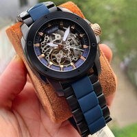 Montre automatique mécanique moderne pour homme en acier noir avec cadran squeletté et mouvement mécanique automatique