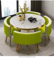 Ensemble de table à manger luxueuse rembourrée avec surface effet marbre, ensemble de meubles de salle à manger 4 places pour la maison et l'appartement