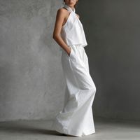 Ensemble 2 pièces tendance : Haut halter torsadé blanc minimaliste et pantalon large à taille élastique avec poches pour femme – Idéal pour les vacances