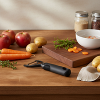 Multifunctionele roestvrijstalen draaibare groenteschiller, -snijder en -hakker met zachte PP-handgreep, handmatig fruit- en groentegereedschap