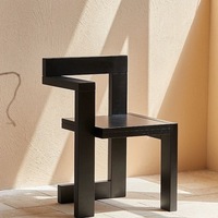 Fauteuil d'appoint en bois teinté, design bloc asymétrique, assise et dossier sculpturale, pour salon, vente en gros