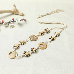 Cinturón ancho vintage bohemio <span class=keywords><strong>de</strong></span> macramé con cuentas <span class=keywords><strong>de</strong></span> madera, cuerda <span class=keywords><strong>de</strong></span> algodón, hebilla redonda, borlas y cadena <span class=keywords><strong>de</strong></span> cintura tejida <span class=keywords><strong>de</strong></span> cuerda encerada para mujer, ideal para usar con falda. - Product Image 2