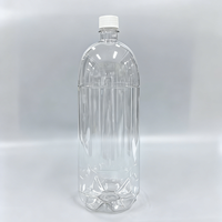 Vente en gros de bouteilles en plastique PET de grande capacité de 2 L pour jus, boissons, eau minérale, boissons énergisantes, avec bouchon à vis