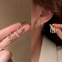 Pendientes de tuerca micro-infundidos para mujer, pendientes únicos de fila de circón a la moda para fiesta, forma geométrica, diseño de cuatro garras frío