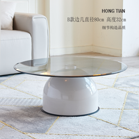 Ensemble de tables basses en métal de style moderne et luxueux avec plateau en verre, design minimaliste, tables d'appoint haut de gamme