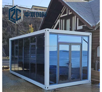 Kit de construction modulaire préfabriqué Zhongchen à faible coût, maison et bureau en conteneur plat de 20 pieds avec structure en acier léger