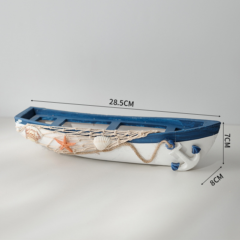 Voilier bleu foncé de taille moyenne