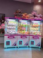 Machine à griffes à monnayeur pour peluches, avec support japonais et construction métallique, pour centre commercial et salle de jeux
