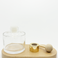 Bouteille diffuseur d'arômes en verre 50ml/100ml avec bouchon à vis, estampage à chaud, couleur personnalisée et bois