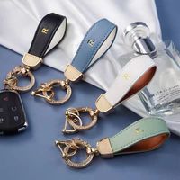Nouveau porte-clés coloré, simple et écologique en alliage de zinc et cuir PU pour voiture, anti-perte, accessoires haut de gamme, vente en gros