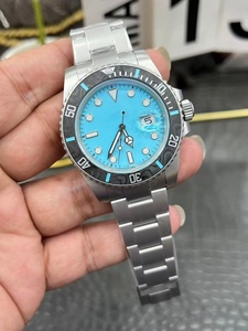 Reloj mecánico automático para hombre de 41 mm con esfera azul, función de fecha iluminada y bisel giratorio de cerámica, en acero inoxidable. - Product Image 2