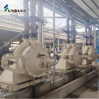 Raffineur à double disque Yunda 380V 15000 L/min, engrenage d'alimentation contrôlé par PLC, disque abrasif SS304 42-48 pouces, machine à pulper économe en énergie