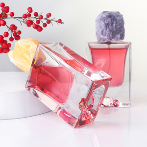 Premium 50ml Polished Clear Glass Perfume Bottles Artistic Sculpted Bottom with Resin Stone-Shaped Cap - Product Image 6