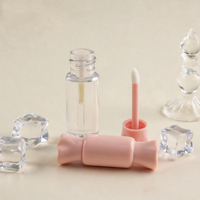 Tubes de brillant à lèvres roses au design mignon en forme de bonbon avec poignée en forme de cœur, tubes de brillant à lèvres en plastique vides, emballage portable pour huile à lèvres