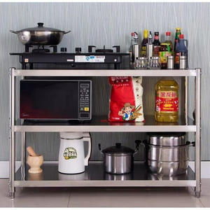 Двухуровневый двухслойный рабочий стол из нержавеющей стали с поддоном для соуса для предприятий по производству и упаковке колбасных изделий - Product Image 5