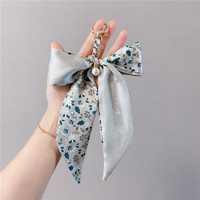 Pendentif de luxe pour sac à main féminin, accessoires de mode, imprimé floral, foulard, perles, porte-clés, nœud