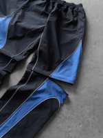 Conjunto Deportivo de 2 Piezas con Pantalones Desmontables, Chaqueta Cortavientos de Nailon Ligero y Transpirable con Diseño de Parches para Hombre