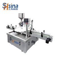 Machine de remplissage automatique multi-têtes pour la production de mise en bouteille continue