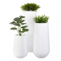 Ventes en gros de grands pots et jardinières ronds classiques en fibre de verre, revêtement en poudre, pour l'extérieur, pour les sols et les centres commerciaux