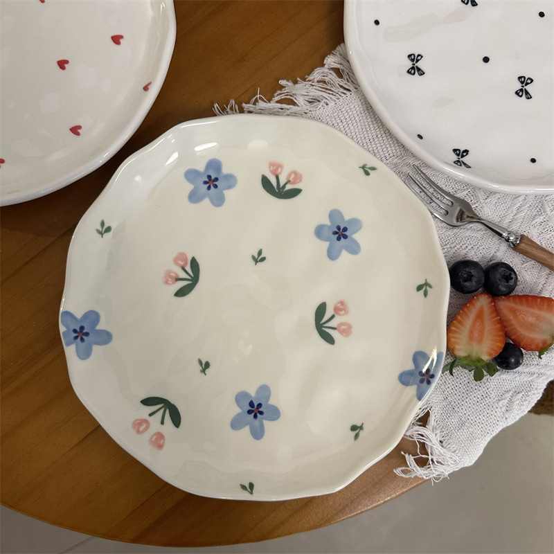 Hand pinch 8 inch plate-blue flowers