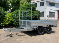 Remorque utilitaire à plateau plat avec côtés rabattables et système de fixation complet