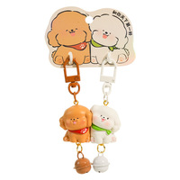 Hot verkopende schattige cartoonhond sleutelhanger in koppelstijl van hars, met schattig huisdierfiguurtje als dagelijks accessoire voor dierenliefhebbers.