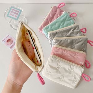 Custom Hot Selling Ins <b>Bow</b> Knot Silver Glossy Surface Makeup Storage Toilet Bag Headphone Data Cable Organizer Change Purse - Product Image 1
