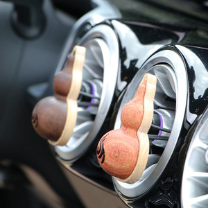 Diffuseur d'huiles essentielles en bois massif de rosewood pour aérateurs de voiture - Product Image 1
