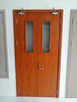 Porte coupe-feu en métal creux conforme aux normes des bâtiments commerciaux avec finition de peinture en spray bois réaliste, porte résistante au feu