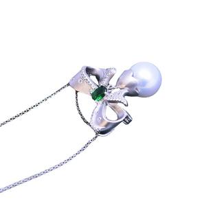 สร้อยคอเงินแท้ S925 ประดับมุกน้ำจืดทรงกลมสีขาว ขนาด 11-12 มม. พร้อมจี้มุกมีตำหนิเล็กน้อย แต่แสงสว่างสวยงาม ประดับด้วยเพชรซิรคอน สำหรับผู้หญิง - Product Image 5