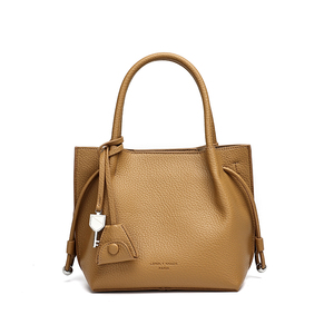 Manufacturer Wholesale 2026 Modern Luxury Ladies Bucket Crossbody Handbags <b>Metal</b> Rivet Soft Durable Waterproof Magnetic Closure - Product Image 1