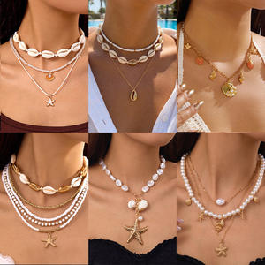 สร้อยคอไข่มุกหลายชั้นแบบใหม่ G 2026 พร้อมจี้รูปปลาดาวและเปลือกหอย ชุบทอง เครื่องประดับชายหาด ขายส่งสำหรับผู้หญิง - Product Image 2